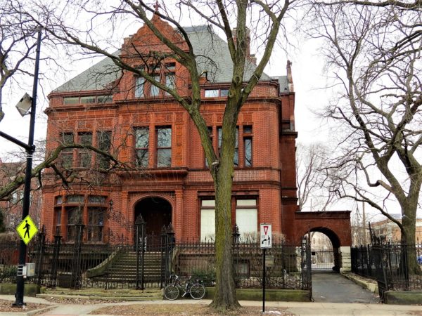 Late 19th Century home and a bicycle during a tour ride.