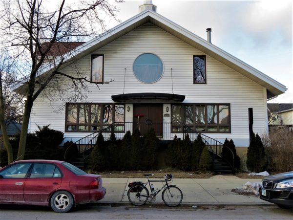 Former church now private residence with a bike during a tour ride.