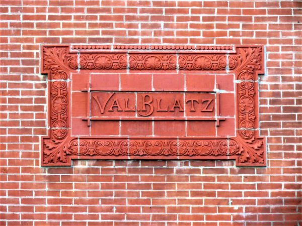 Red brick and floral Val Blatz brewery emblem.