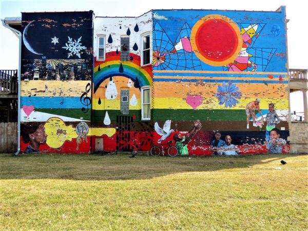 Community mural with a bike during a tour ride.