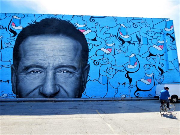 CBA tour rider and Robin Williams/Genie mural.