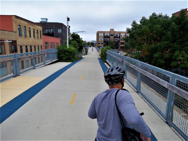 A CBA bike tour rider on the former elevated freight line bike path.