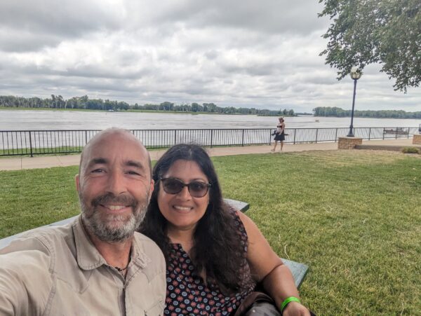 Me and Nitya looking at the camera with the Mississippi River behind.