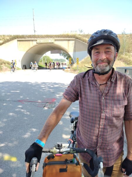 Me with a highway underpass behind.