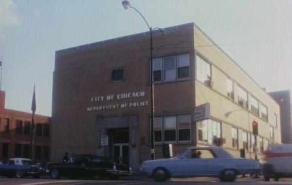 A still from Crime Story showing the 1950s mid century modern police station.